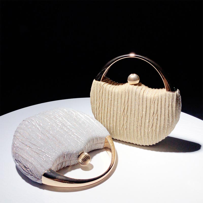 Chique clutch met metalen handvat - Leighton