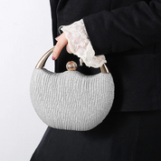 Chique clutch met metalen handvat - Leighton